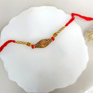 Celestial Bond Stone Rakhi Harmony