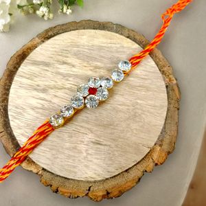 Radiant Gemstone Rakhi Elegance