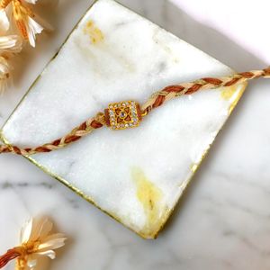 Celestial Bond Stone Rakhi Harmony