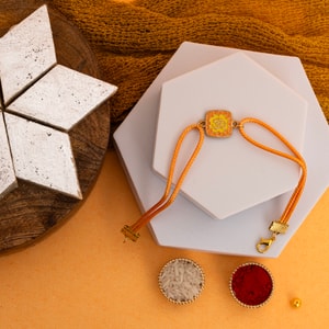 Divine Om Rakhi with Kaju Katli