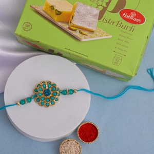 Elegant Turquoise Floral Rakhi with Pista Burfi