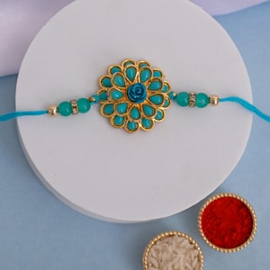 Turquoise Bloom Designer Rakhi