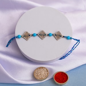 Three Blossom Floral Rakhi