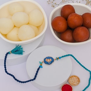 Blessed Ganesha Rakhi with Rasgulla & Gulab Jamun