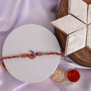 Elegant Peacock Rakhi with Kaju Katli