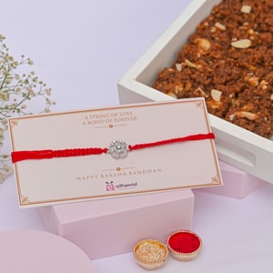 Sparkling Floral CZ Rakhi with Dodha Burfi