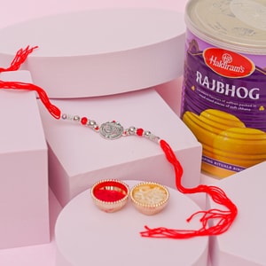 Silver Om Designer Rakhi with Raj Bhog