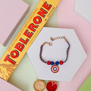 Captain Shield Rakhi with Toblerone Chocolate