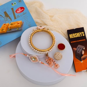 Peach Pearl Bhaiya Bhabhi Rakhi Gift with Milk Cake & Hershey