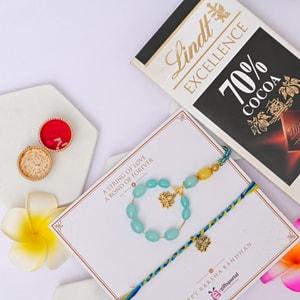 Lotus Bhaiya Bhabhi Rakhi Gift with Lindt Dark Chocolate