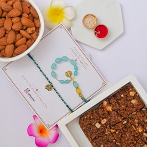 Lotus Bhaiya Bhabhi Rakhi with Dodha Burfi & Almonds