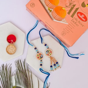 Blue Peacock Bhaiya Bhabhi Rakhi with Motichoor Laddu