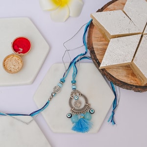 Tree of Life Evil Eye Bhaiya Bhabhi Rakhi with Kaju Katli