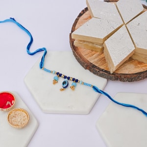 Evil Eye Rakhi Combo with Kaju Katli