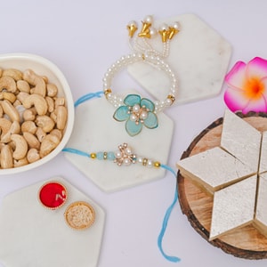 Blue Floral Bhaiya Bhabhi Rakhi with Kaju Katli & Cashews