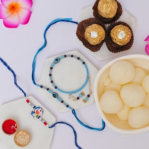 Family Evil Eye Rakhi Hamper with Rasgulla & Ferrero