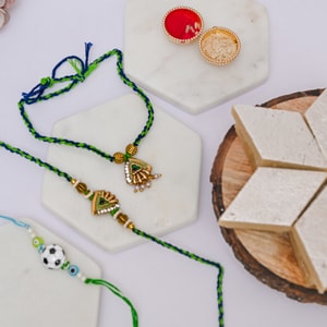 Peacock Family Rakhi Set with Football Kids Rakhi & Kaju Katli