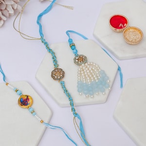 Sacred Om Bhaiya Bhabhi Rakhi Set