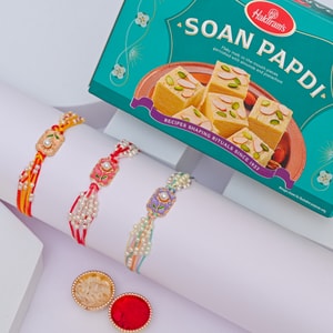 Floral Pearl Rakhi Trio with Soan Papdi