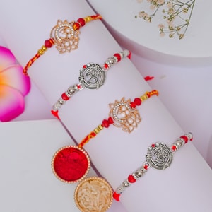Diamond Om Rakhi Set for Four